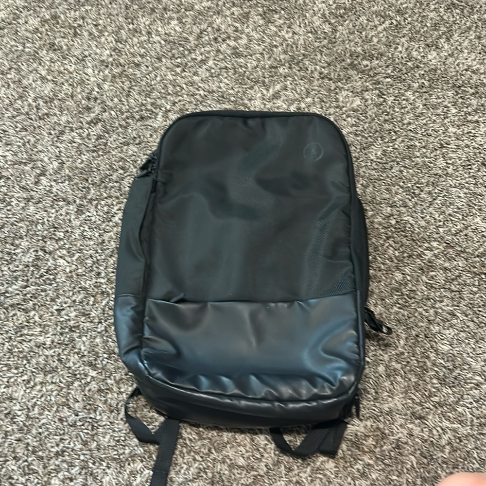 Black DELL computer and accessory backpack.